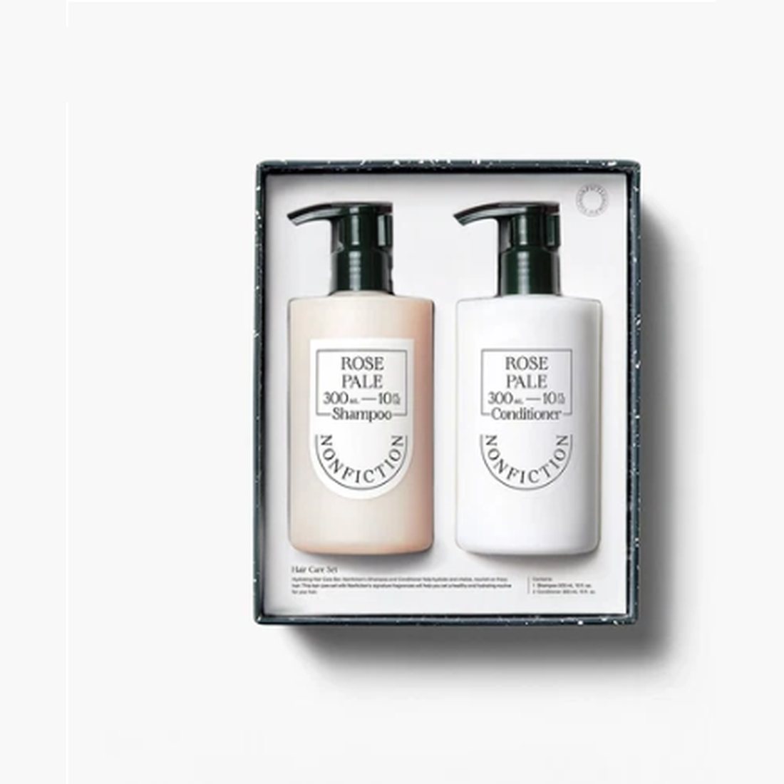 Rose Pale shampoo and conditioner bottles in a dark gift box.