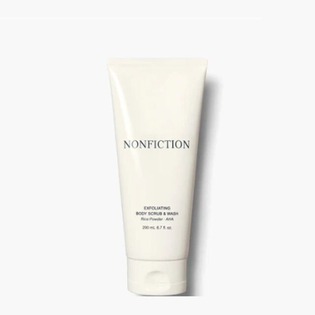 NONFICTION Exfoliating Body Scrub & Wash in a cream squeeze tube.