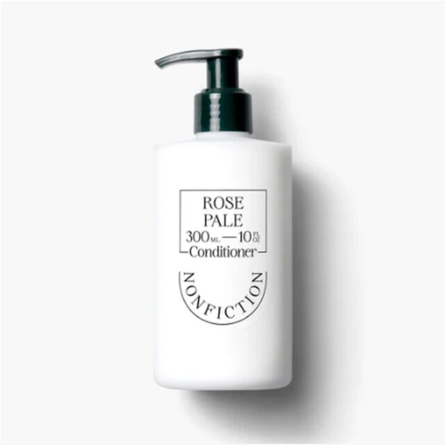Rose Pale Conditioner in a white pump bottle with a dark green pump.