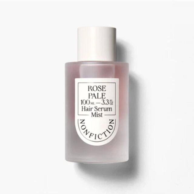 Rose Pale Hair Serum Mist in a frosted blush glass bottle with a cream cap.
