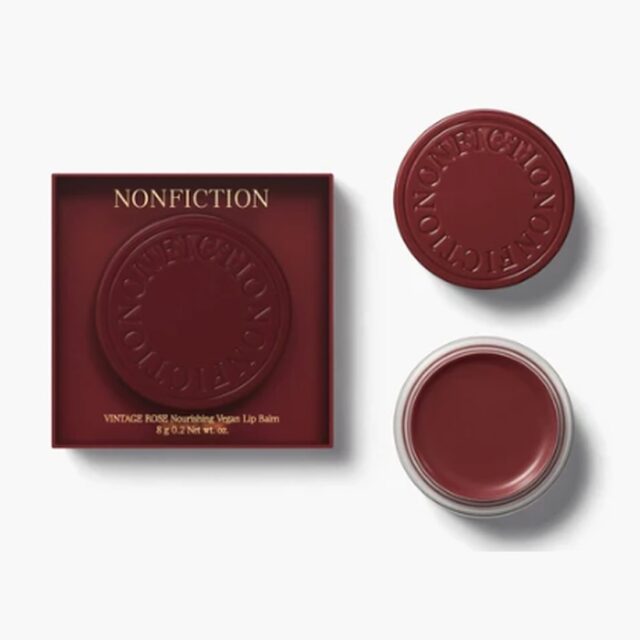Vintage Rose Vegan Lip & Cheek Balm in a deep burgundy case with an embossed lid, shown beside the open balm.