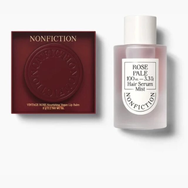 Vintage Rose lip and cheek balm in its burgundy case beside a Rose Pale hair serum mist bottle.